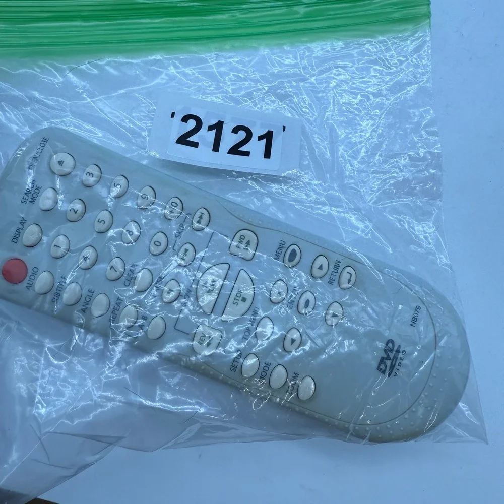 DVD Player Remote Control NB079 Replacement Universal Remote- back‎ cip broke